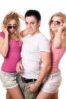 two blonde women with handsome young man photo