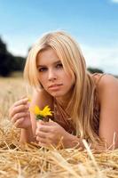 Young woman with flower photo