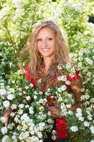 Curly young blond woman photo