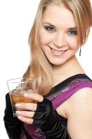 Smiling young blonde with a glass photo