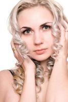 Portrait of pretty young blonde. Isolated photo