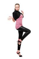 Playful young woman in black leggings photo