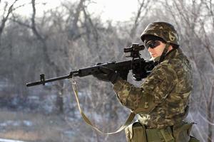 Soldier with a sniper rifle photo