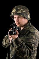 Watchful soldier with m16 photo