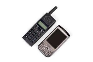 Old and new mobile phones. Isolated on white
