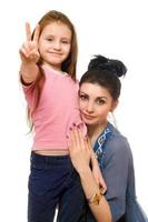 Portrait of young mother and little daughter. Isolated photo