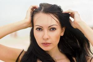 young woman on the beach photo