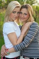 Portrait of two beautiful young blonde photo
