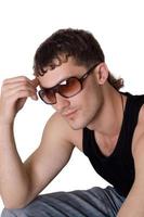 Young man in sunglasses. Isolated on white background 1 photo