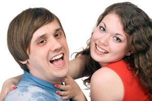 Portrait of  the smiling young couple. Isolated. photo