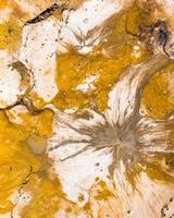 Top down aerial view scenic natural mud volcanoes formations in Chachuna nature reserve, Georgia photo