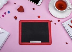 empty black chalk board with a red frame photo