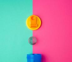 plastic blue shaker bottle with a yellow cap and an iron ball for sports people photo