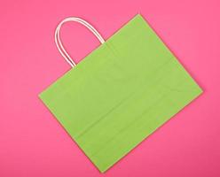 empty green paper shopping bag with a handle photo