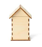 wooden house with a roof isolated on a white background. ecological kids toy