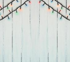 Electric Christmas garland with colored small bulbs photo