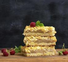 stack of baked slices of pie with apples photo