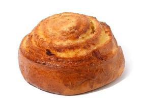 Round cinnamon bun on a white isolated background photo