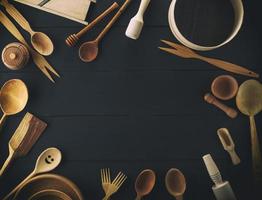 kitchen items on a black table, top view photo