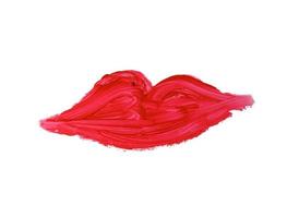 sample of red lipstick in the shape of a kiss on a white background photo