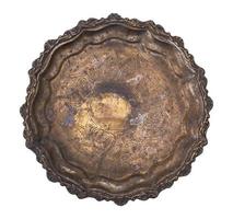 empty round copper plate isolated on white background photo