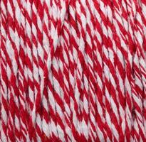 Texture of red and white cooking string, macro photo