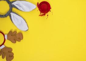 carnival headdresses on a yellow background photo