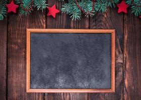 empty wooden frame on a brown background of boards photo