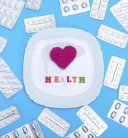 white square ceramic plate with red heart and inscription health photo