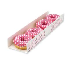 baked donuts with pink icing in white cardboard box isolated on white background photo