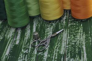 Macro photo of scissors on a background thread