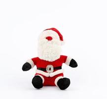 traditional toy santa claus in a red suit and white beard photo