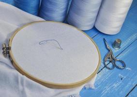 Hoop with the fabric for embroidery photo