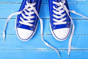 pair of blue textile shoes photo