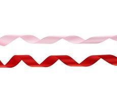 curled red and pink satin ribbons isolated on white background photo