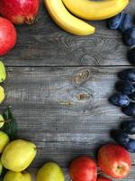 Fruits background old wooden frame lined photo
