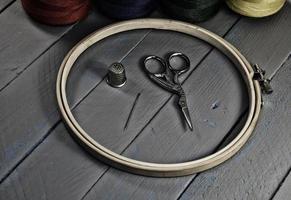 Items for needlework. The stylized images in dark colors photo