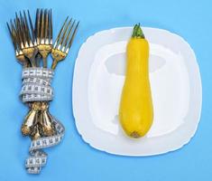 yellow squash on a white ceramic plate photo