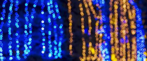 abstract blurred background with round blue and yellow bokeh photo