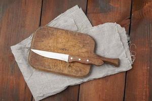 very old empty wooden rectangular cutting board, top view photo