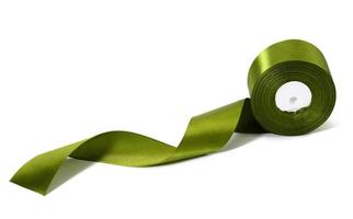 roll of silk green ribbon, wrapping decor photo