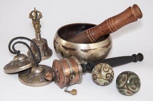 Singing Bowl and a set of Tibetan religious objects photo