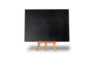 empty black easel on a tripod isolated on white background photo