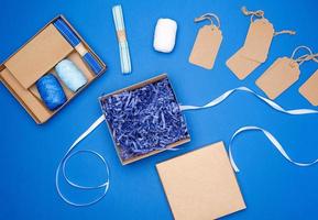 set for packing holiday gifts on a blue background photo