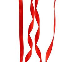 set of red years with various bends and twisting isolated on white background photo