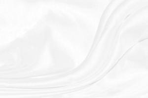 Texture, background, pattern. White cloth background abstract with soft waves, great for dresses or suits, where transparency and flow are required photo