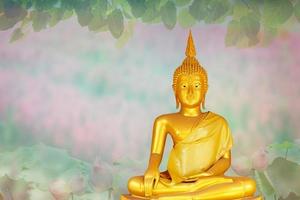 Makha Asanaha Visakha Bucha Day Golden Buddha image. Background of Bodhi leaves with shining light. Soft image and smooth focus style photo