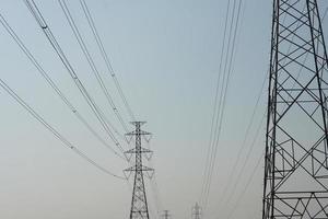 silhouette of high voltage transmission tower photo