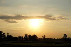 background of the setting sun in the evening photo