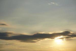 background of the setting sun in the evening photo